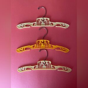 Set of Three Vintage Style Hangers in Yellow and Orange
